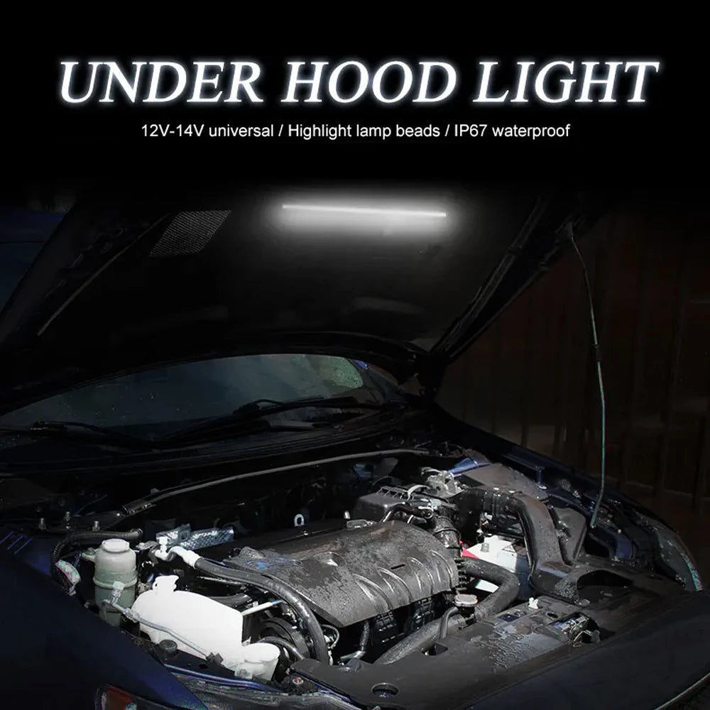 Under hood light LED work light with automatic on/off switch installed in a car engine bay.