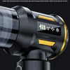 A close-up view of a black cordless handheld vacuum cleaner with a gold accent, showing the main body and suction nozzle.