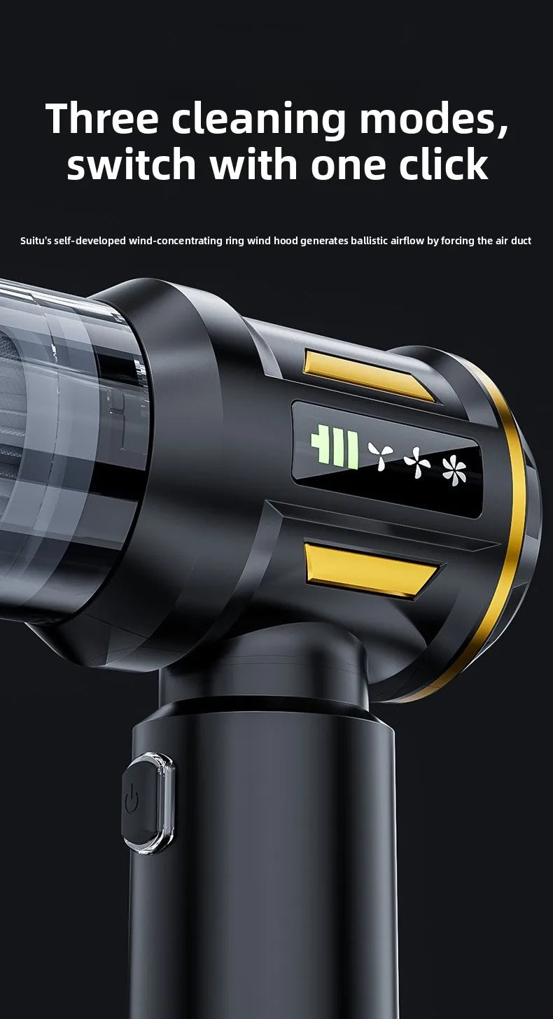 A close-up view of a black cordless handheld vacuum cleaner with a gold accent, showing the main body and suction nozzle.