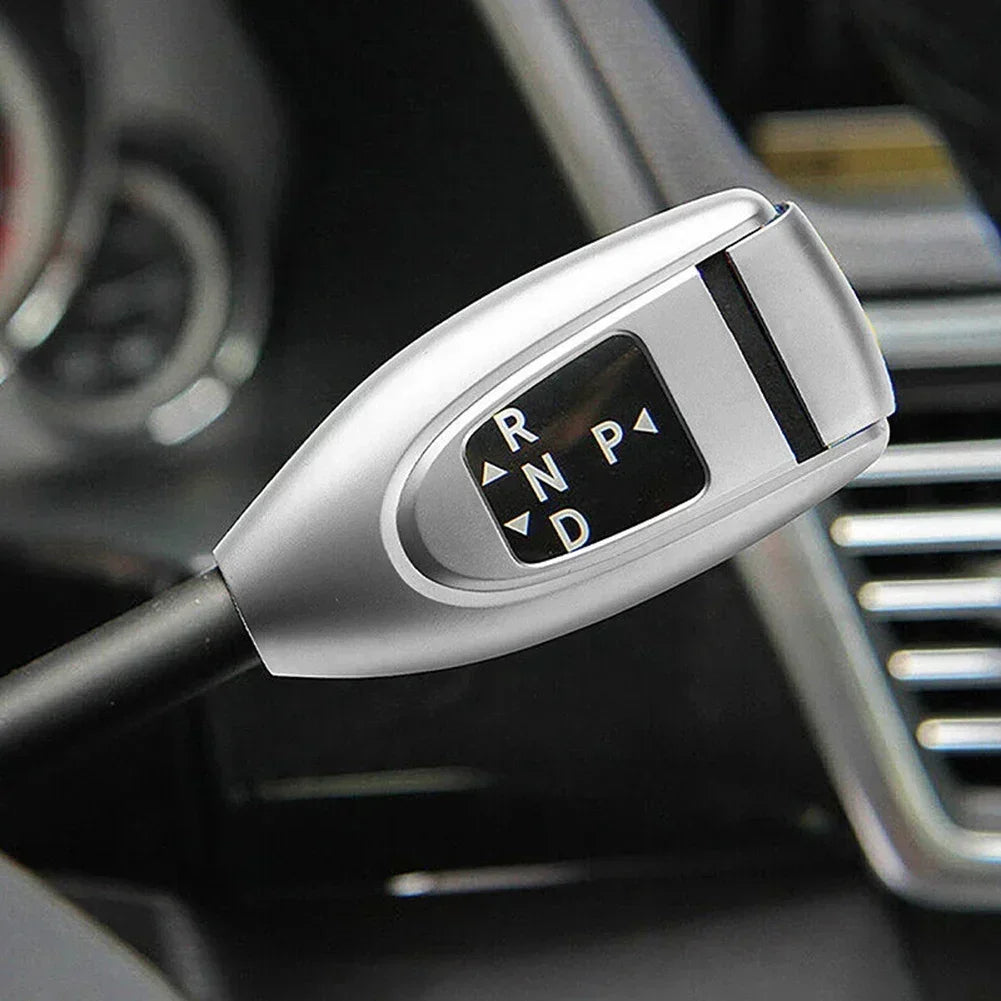 Silver replacement Wiper shift lever covers for a Mercedes S-Class vehicle.