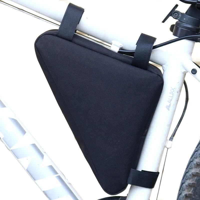 Black waterproof bike frame bag mounted on a white bicycle frame.
