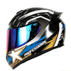 A black and silver universal motorcycle helmet with a blue visor featuring a professional racing design.