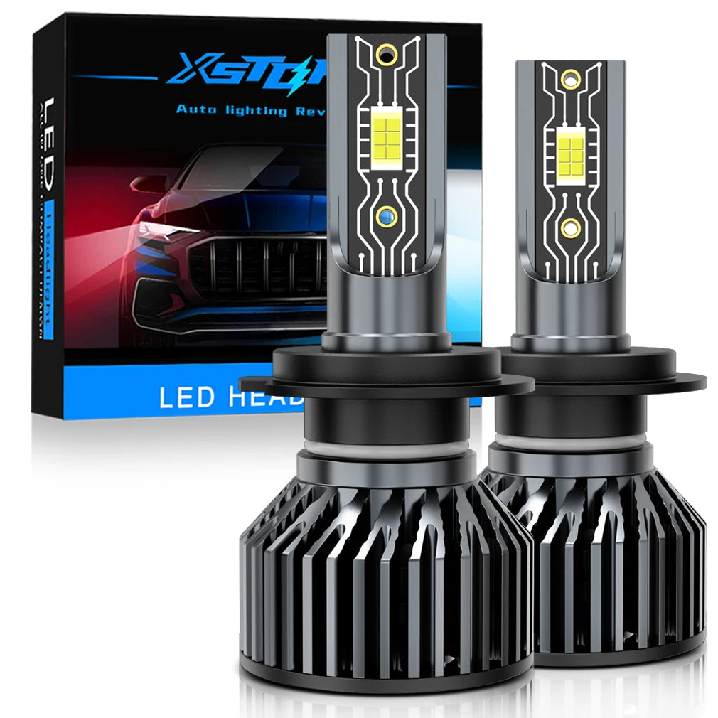 A set of universal LED car headlight bulbs and mounting kits shown next to their packaging.