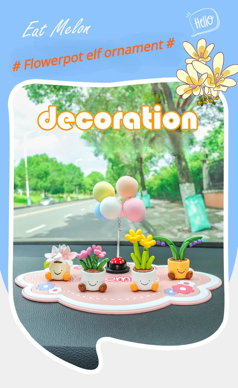 Dekoration mit Harz-Blumen-Topf, Elfenauto, bunten Ballons und Pflanzen auf rosa Basis.