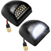 A black high brightness 18 LED license plate light assembly for trucks.