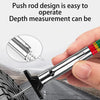A hand holds a push rod depth measurement tool, demonstrating its use for measuring tire tread depth.