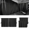 Black car privacy curtain set installed on a vehicle window.