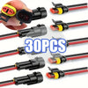 A collection of 30 durable black wire connectors with red and yellow insulation for automotive and marine use.