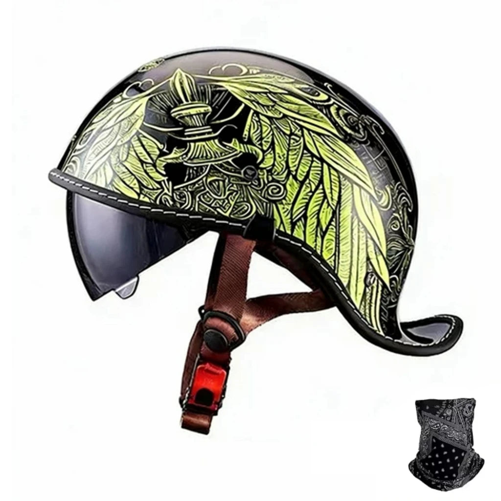 Vintage-Motorradhelm mit schwarzem Finish und grünem Blattdesign.