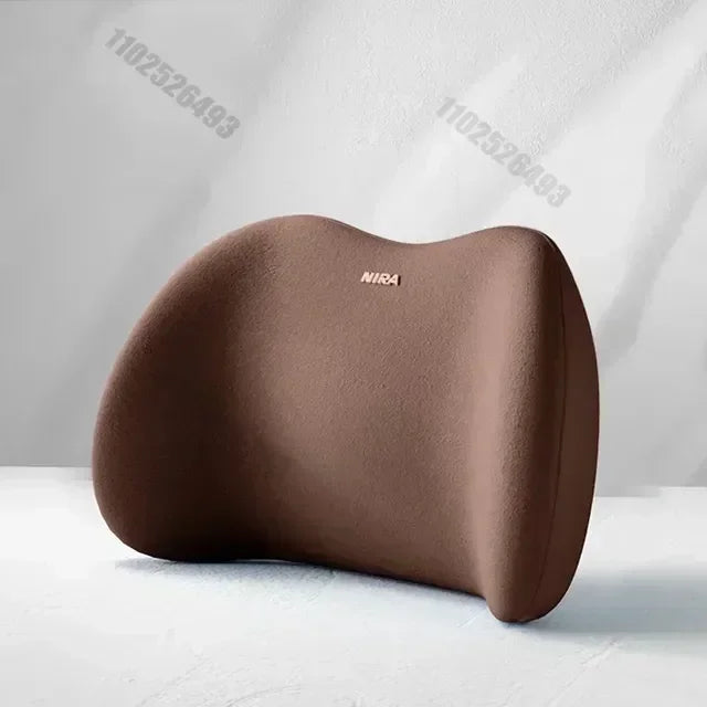 A brown ergonomic memory foam neck and lumbar pillow set resting on a white surface.