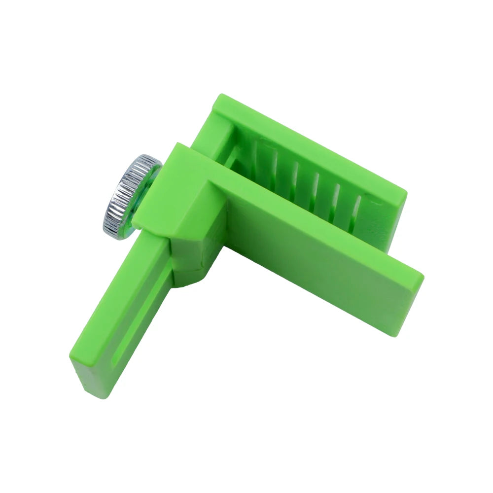 A bright green precision vinyl film edge cutting applicator tool.