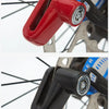 A close-up view of a red and black heavy duty motorcycle wheel disc brake lock mechanism.