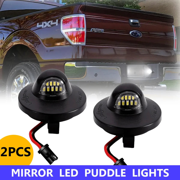 Two pairs of mirror LED puddle lights for a truck are shown against a background of a maroon pickup.