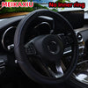Black PU leather embossed steering wheel cover inside a car