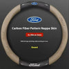 A round brown carbon fiber patterned nappa skin steering wheel cover for a Ford vehicle.