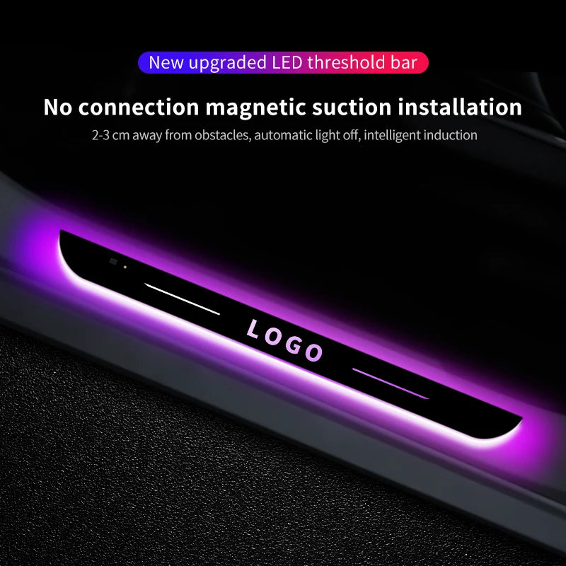 A custom logo LED threshold bar illuminates a door sill with purple light, demonstrating magnetic suction installation.