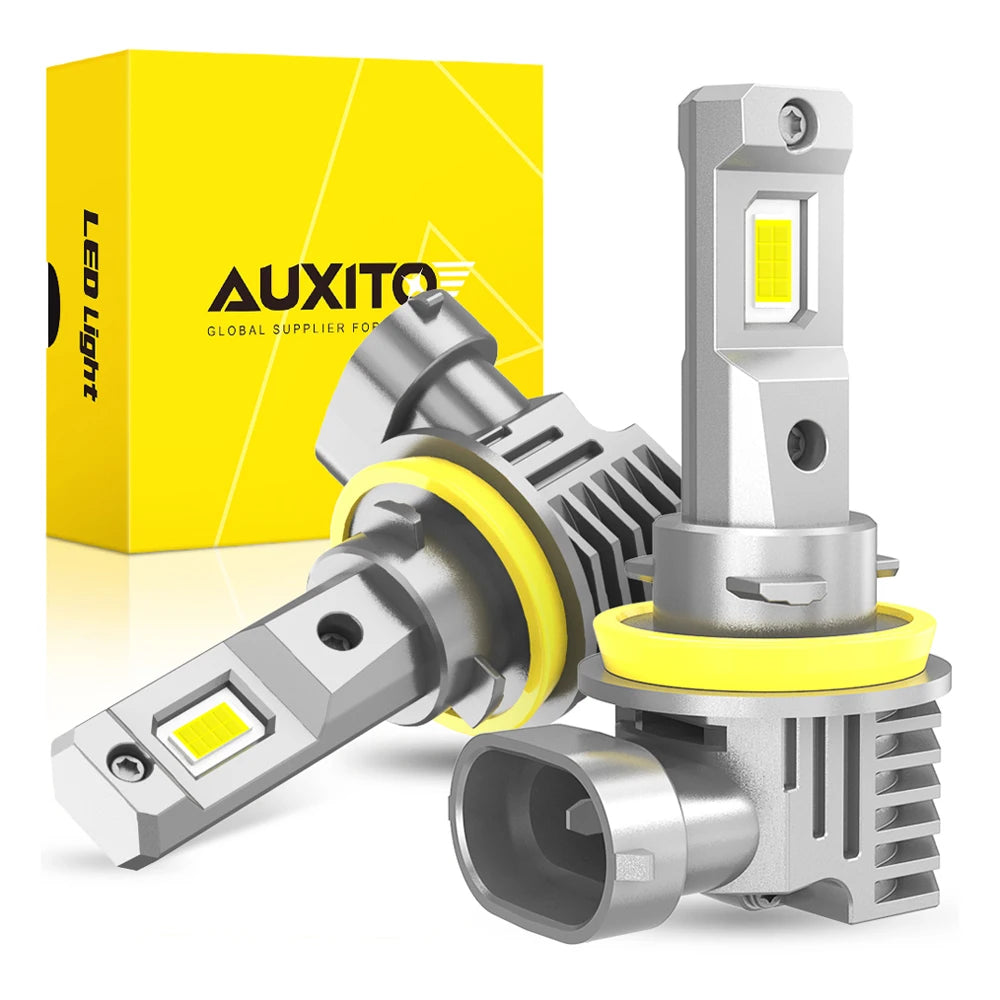 Una bombilla LED plateada y su conjunto de montaje junto a una caja amarilla etiquetada como AUXITO GLOBAL SUPPLIER PARA.