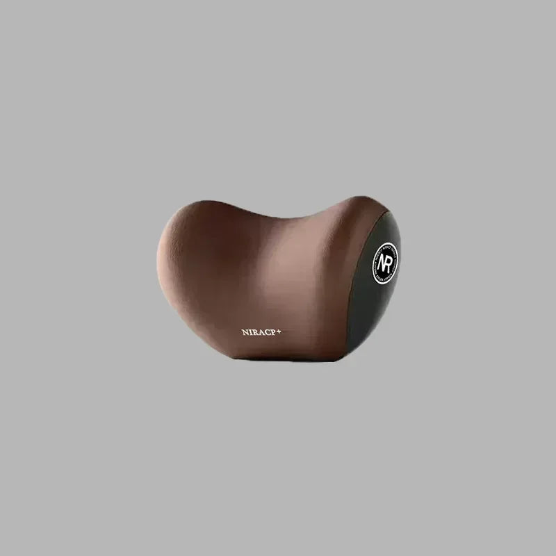 A brown ergonomic memory foam pillow with a black accent, designed for car neck and lumbar support.