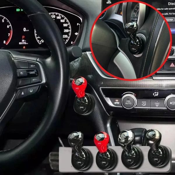 Close-up view of an all-metal cylindrical car start button accessory installed on a vehicle's interior dashboard.