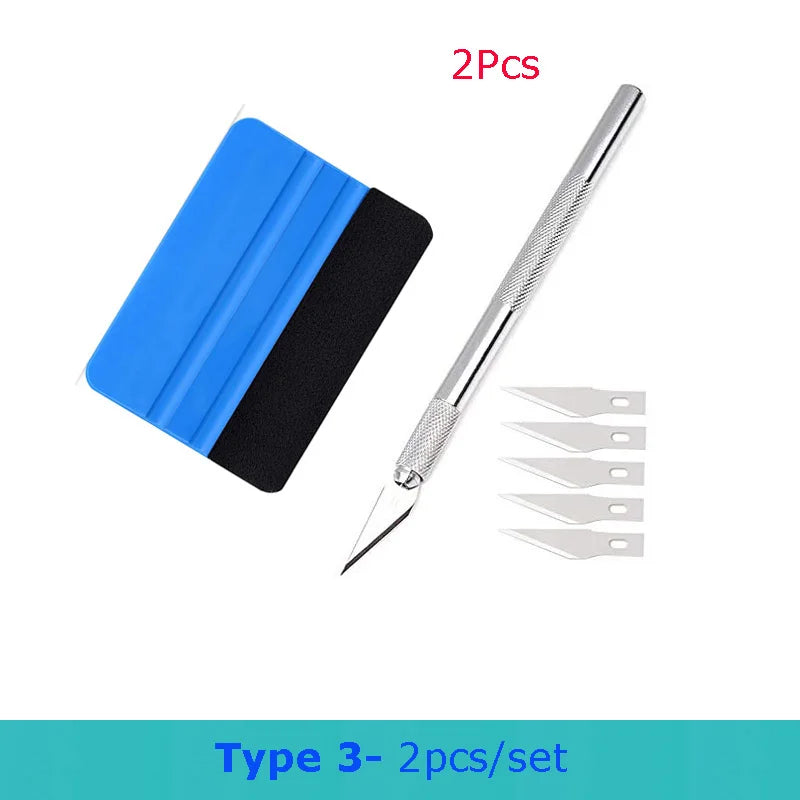A set of two professional car vinyl wrapping tools, including a blue and black plastic tool and a silver metal tool.