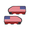 Two rectangular truck bed rail hole plugs featuring the American flag design in red, white, and blue.