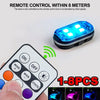 A remote control for a multi-mode RGB strobe warning light, showing various color modes.