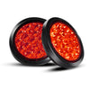 A pair of dual high-brightness truck tail lights with clear red lenses shown in a close-up view.