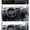Close-up view of a Jeep Renegade dashboard with air vent covers installed on the steering wheel and dashboard.