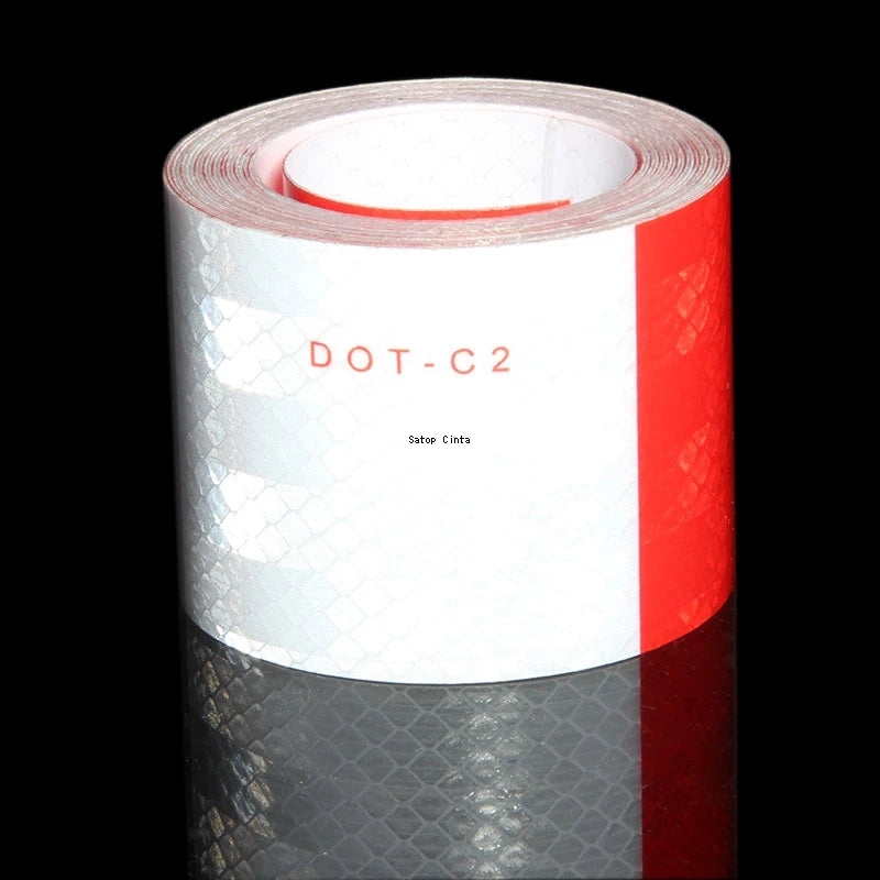 Roll of white and red high-visibility reflective safety tape labeled DOT-C2