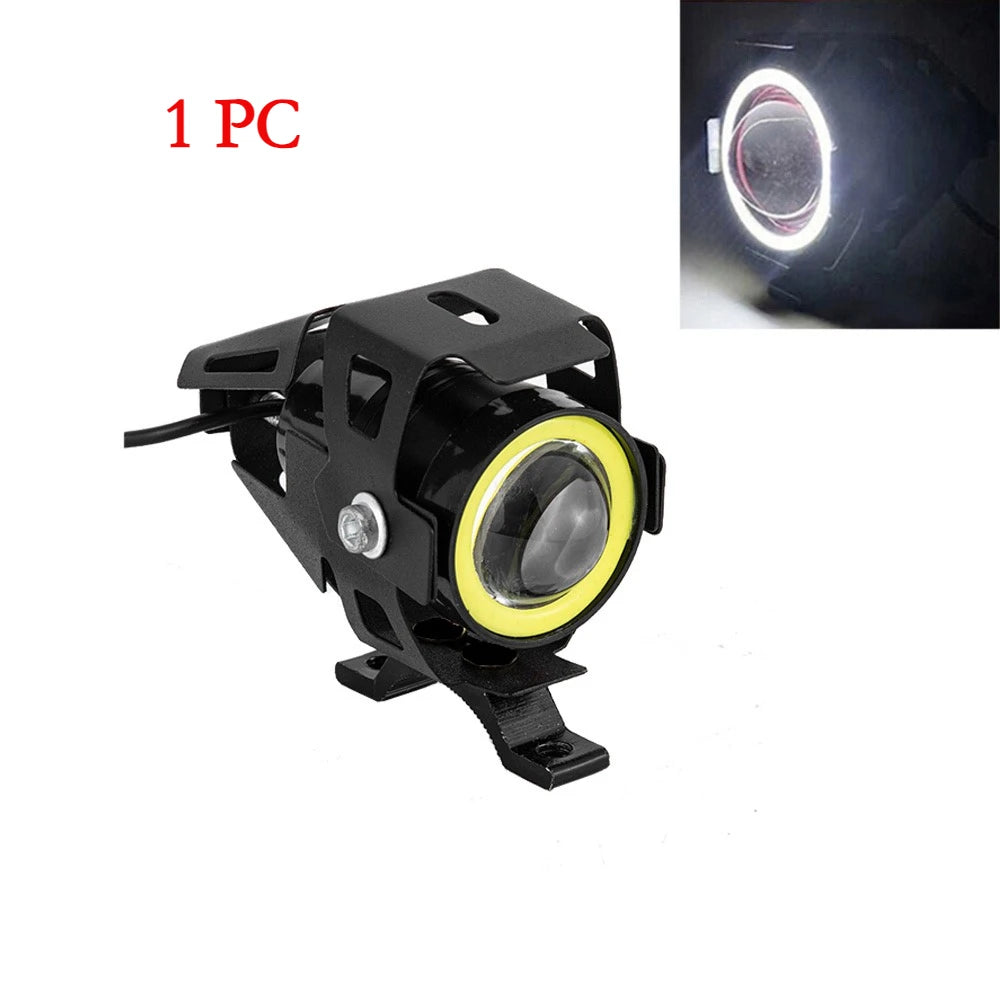 A single black universal LED motorcycle headlight spotlight with a circular lens.