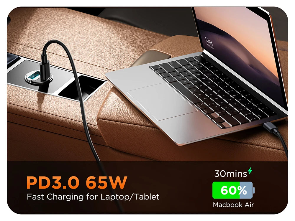 A laptop is being fast charged using a PD3.0 65W charger for a MacBook Air.