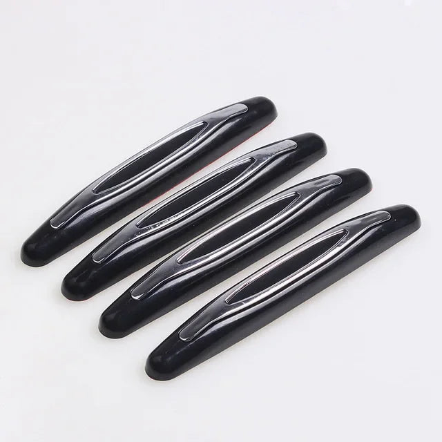 A set of black car door edge protection strips shown diagonally on a white background.
