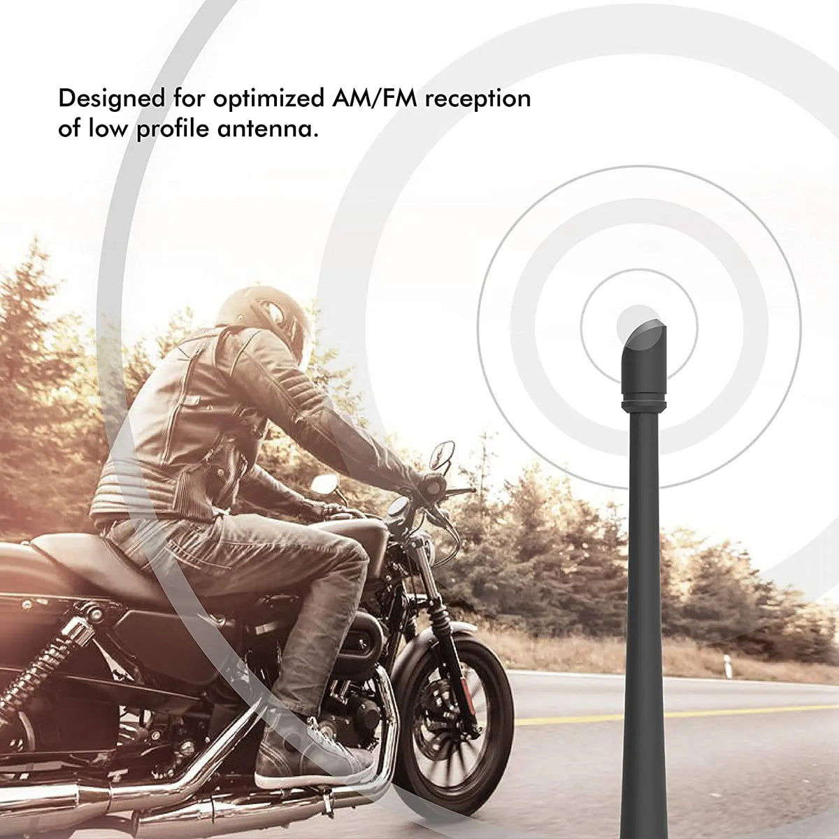 A motorcycle is shown riding on a road with an antenna designed for optimized AM/FM reception.