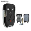 A black replacement smart key fob shell with a silver trim and a separate key blade shown next to it.