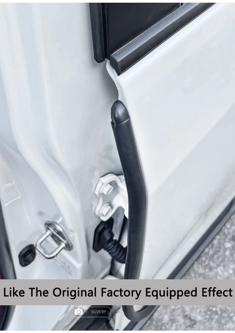 Close-up of a white car door edge with a black weatherstrip seal installed.