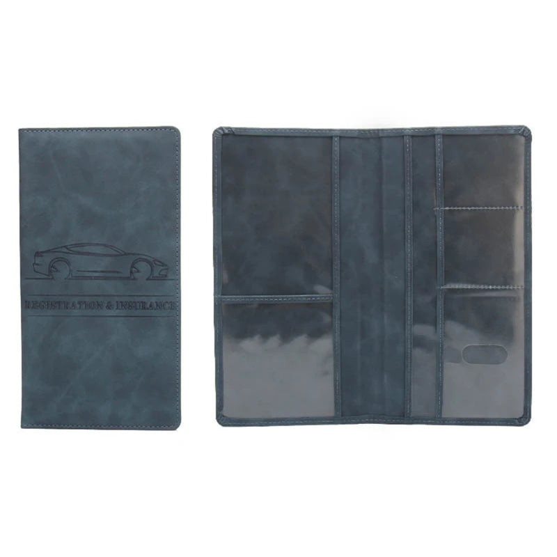 A dark blue leather document and ID holder with a clear plastic sleeve and embossed car design.
