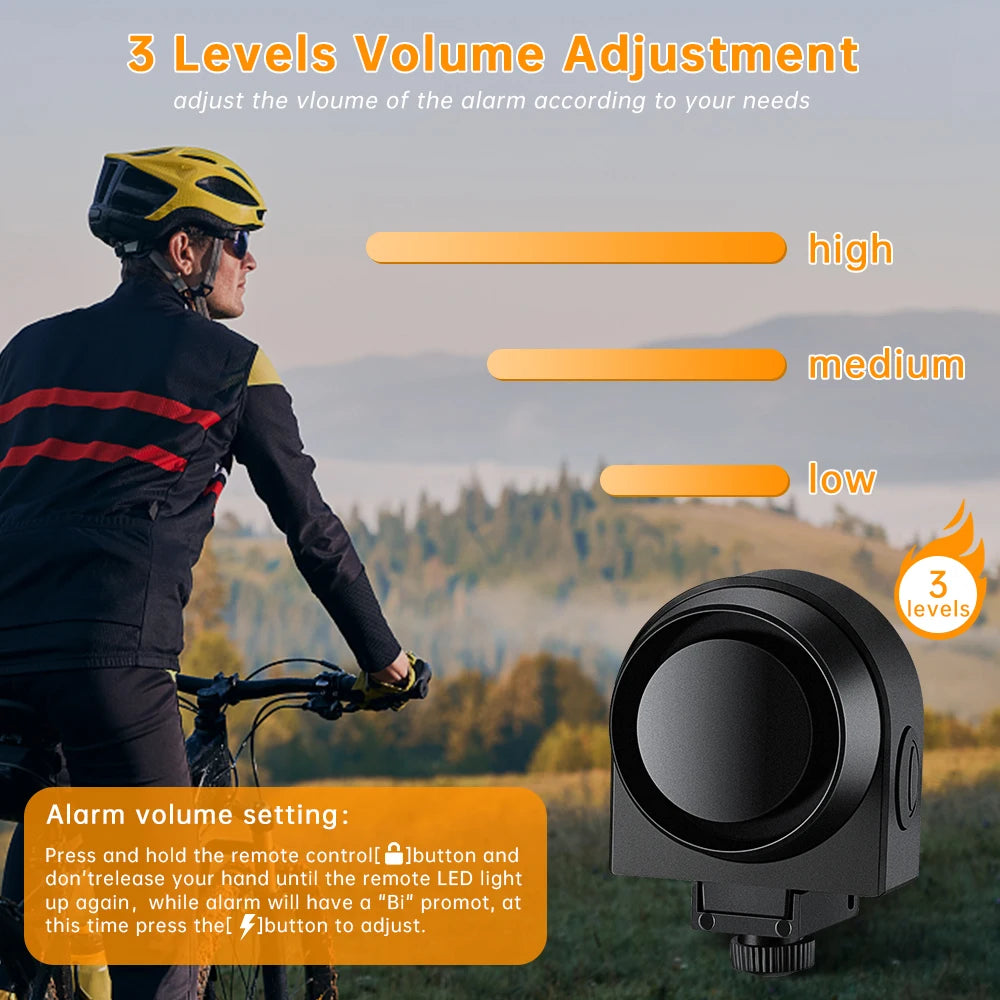 Una persona ajusta el volumen de una alarma de vibración inalámbrica con un control remoto, junto al dispositivo.