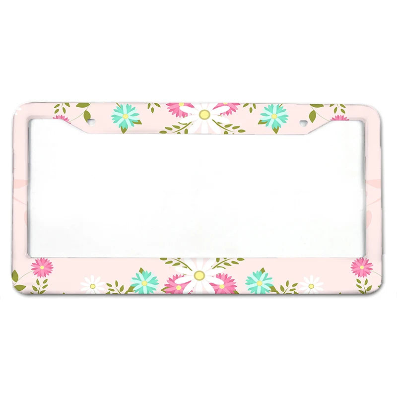 Rechteckige Aluminium-Kennzeichenabdeckung mit rosa und grünem Blumenmuster.