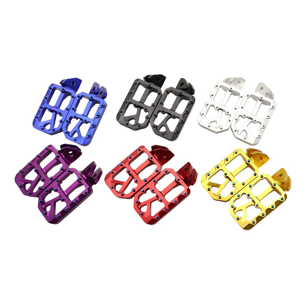 A collection of ten CNC aluminum foot pegs for Sur Ron electric bikes in various colors including blue, gray, white, purple, 