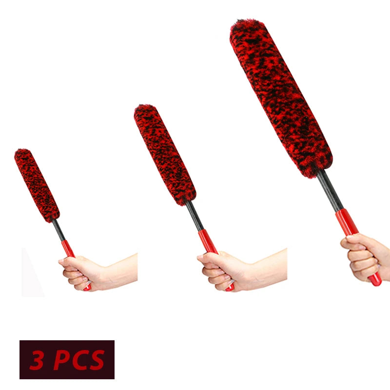Three red fuzzy wool cleaning brushes for auto and motorcycle detailing