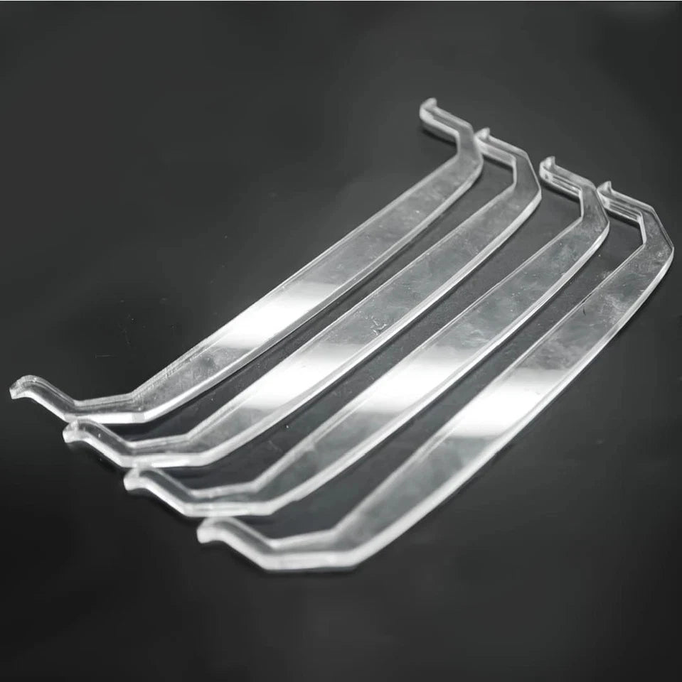 Clear plastic amber LED front grille lights for a Ford Ranger Raptor