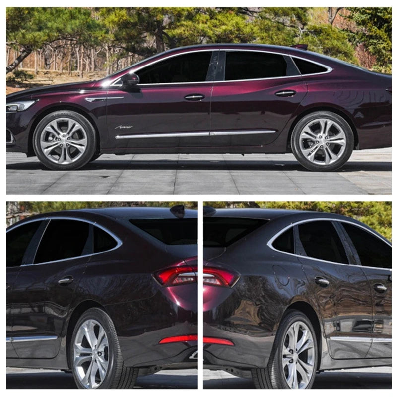 A side view of a dark red luxury sedan showing the window tint film application.