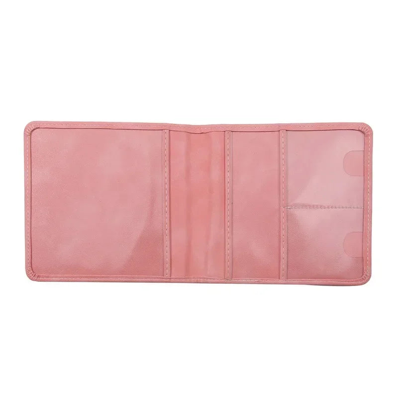 A pink leather document holder with multiple slots for cards and IDs.