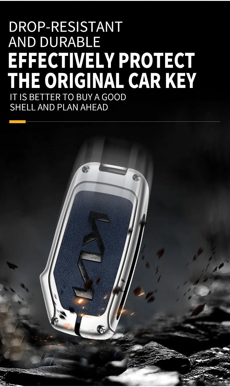 A close-up of a metallic car key is shown being protected inside a durable, drop-resistant leather alloy case.