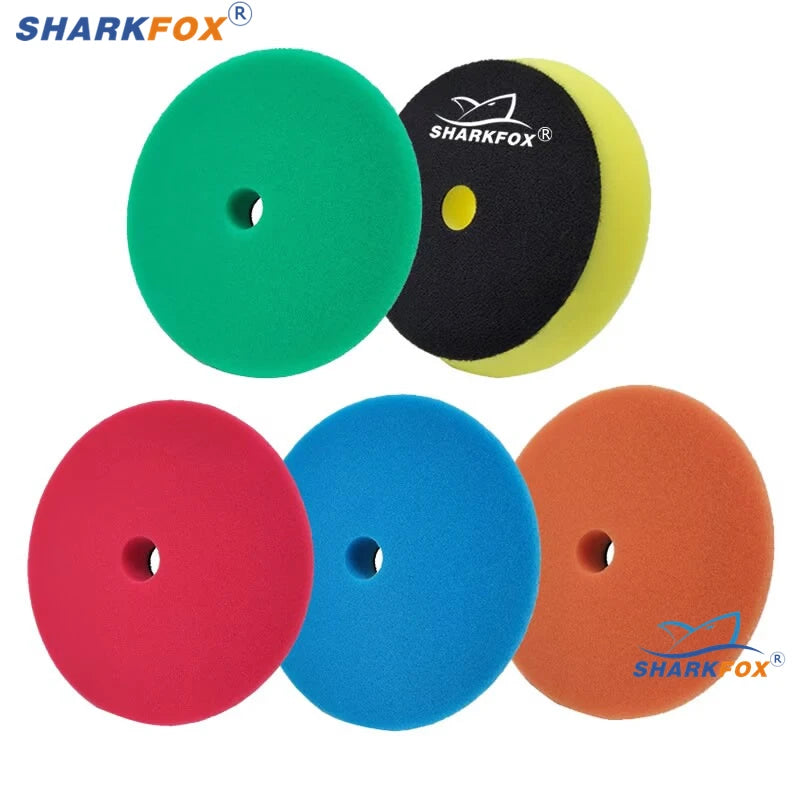 Four colored polishing sponge pads for car buffing including green, black, yellow, and red.