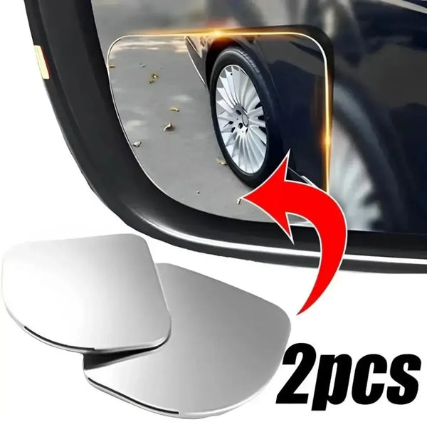 Two silver blind spot car mirrors shown next to a vehicle's side mirror.
