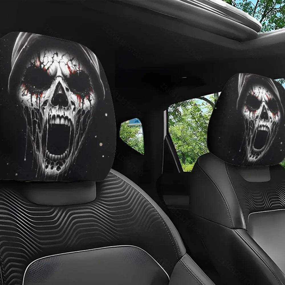 Black car seat headrest covers featuring a skull design with blood splatter and teeth visible.