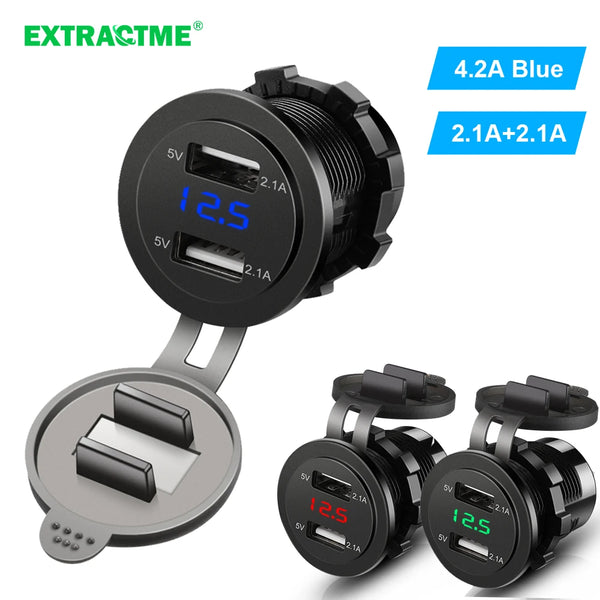 A black dual USB car charger adapter with blue LED display showing 12.5 volts and 2.1A output.
