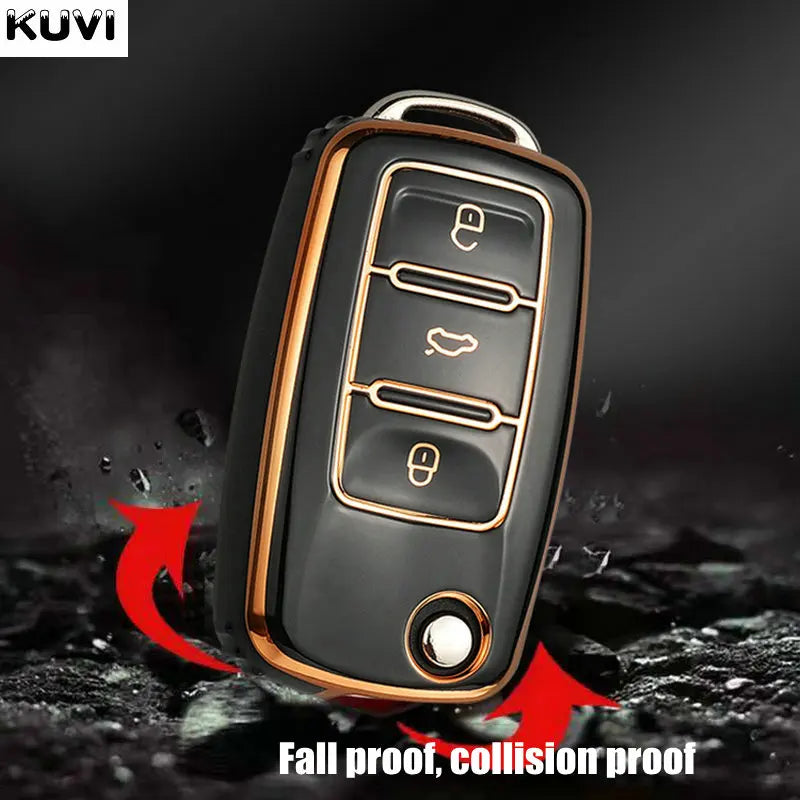 Black TPU car key cover with gold accents demonstrating fall and collision proof features.