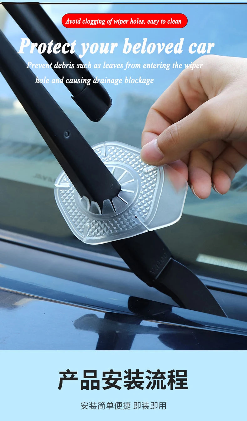 A hand is placing a clear plastic protective cover onto the wiper hole of a car windshield.